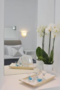 Posteľ alebo postele v izbe v ubytovaní Romantica Suites