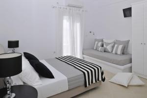 Posteľ alebo postele v izbe v ubytovaní Romantica Suites