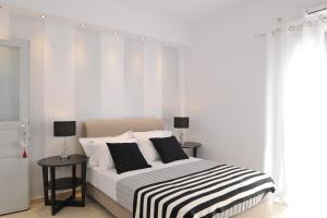 Posteľ alebo postele v izbe v ubytovaní Romantica Suites