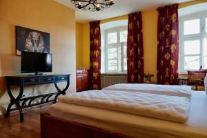 Katil atau katil-katil dalam bilik di Hotel Endorfer Hof