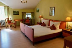 Postel nebo postele na pokoji v ubytování Hotel Endorfer Hof