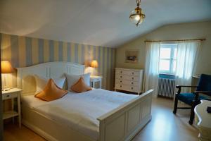 Postel nebo postele na pokoji v ubytování Hotel Endorfer Hof
