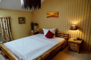 Postel nebo postele na pokoji v ubytování Hotel Endorfer Hof