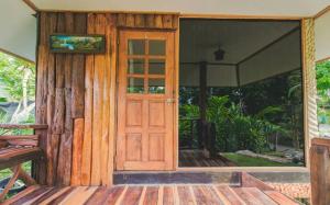 Zahrada ubytování NonKan HomeStay นอนกาญจน์ โฮมสเตย์