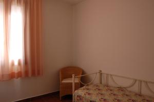 Posteľ alebo postele v izbe v ubytovaní Borgo Valmarina