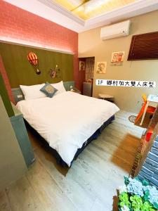Fotografie z fotogalerie ubytování 希臘童話民宿-近花蓮火車站 v destinaci Chua-lien + 11 fotografií