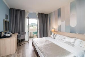 Voodi või voodid majutusasutuse Berkeley Hotel toas