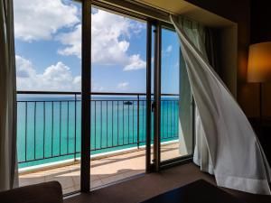 una habitación con vista al mar en Hotel Resonex Nago, en Nago 133 fotos más