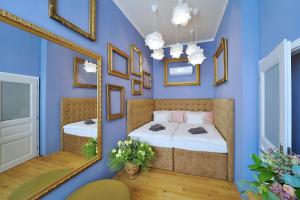 Posteľ alebo postele v izbe v ubytovaní Kalina Apartments