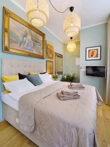 Posteľ alebo postele v izbe v ubytovaní Kalina Apartments