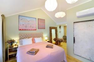 Posteľ alebo postele v izbe v ubytovaní Kalina Apartments
