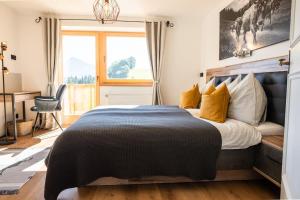 מיטה או מיטות בחדר ב-Apartment zu Hollenau