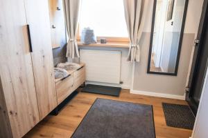 Tempat tidur dalam kamar di Apartment zu Hollenau