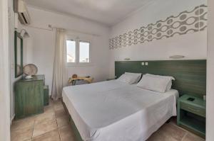 Letto o letti in una camera di Ecoresort Hotel Zefyros