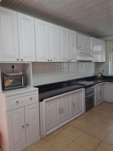 Kuchyň nebo kuchyňský kout v ubytování SEWANS PLACE Homestay