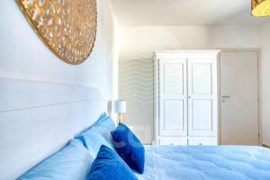 En eller flere senge i et værelse på Villa Arya - Piscina privata By Cala Salento