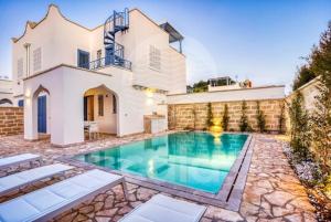 Swimmingpoolen hos eller tæt på Villa Arya - Piscina privata By Cala Salento