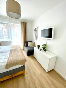Łóżko lub łóżka w pokoju w obiekcie App. Seyrl im Haus Karoline