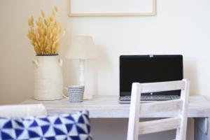 A television and/or entertainment centre at "Sunset Garden" apartment