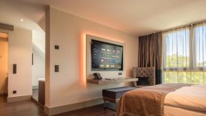 Postel nebo postele na pokoji v ubytování Innspire Hotel