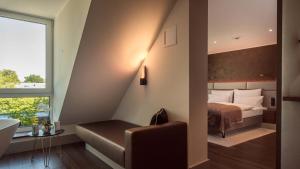 Postel nebo postele na pokoji v ubytování Innspire Hotel