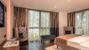 Postel nebo postele na pokoji v ubytování Innspire Hotel