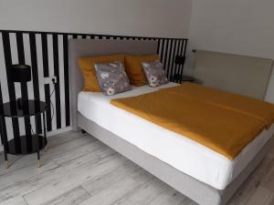 Llit o llits en una habitació de Apartment Kampenwand