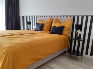 מיטה או מיטות בחדר ב-Apartment Kampenwand