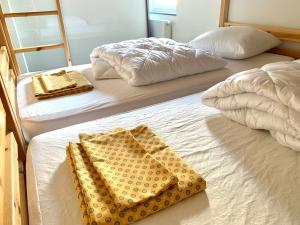 Postelja oz. postelje v sobi nastanitve Vakantieappartement Emiel Centrum Oostende
