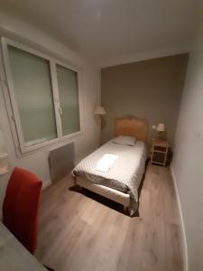 Hotel Les Voyageurs客房内的一张或多张床位