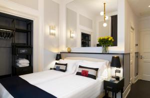 Säng eller sängar i ett rum på Ricciardelli Luxury Studios - Piazza di Spagna