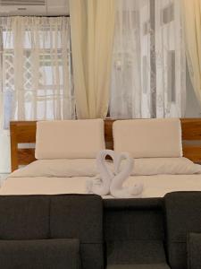 Posezení v ubytování LUNA OSLOB TRAVELLERS INN - Beach Front