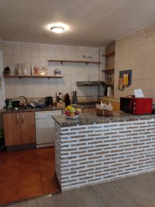 Kuchyňa alebo kuchynka v ubytovaní Apartamento Dúplex El Monumento