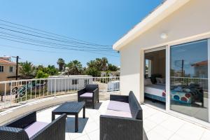 Balkón nebo terasa v ubytování Villa Oasis by Ezoria Villas