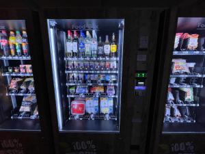 a vending machine filled with lots of drinks at Ferienpark Thüle in Friesoythe