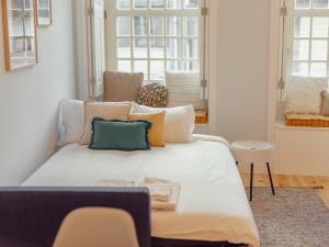 Postel nebo postele na pokoji v ubytování OPORTO GUEST Poveiros Home