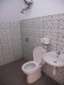 Koupelna v ubytování Tumpaksewu Homestay