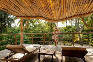 Un balcón o terraza de Zanzibar White Sand Luxury Villas & Spa - Relais & Chateaux