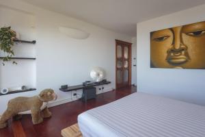 Posteľ alebo postele v izbe v ubytovaní Casa Lorenzo