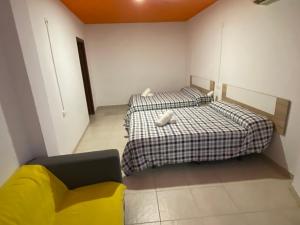 Postel nebo postele na pokoji v ubytování Arc House Ribera Only Adults