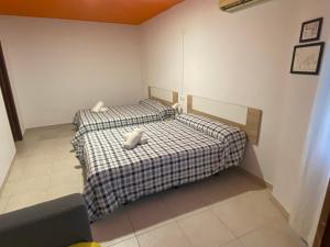 Postel nebo postele na pokoji v ubytování Arc House Ribera Only Adults