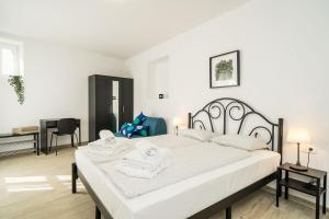 Posteľ alebo postele v izbe v ubytovaní Residence & Pool Villa Schwarz Suites