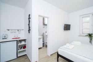 Posteľ alebo postele v izbe v ubytovaní Residence & Pool Villa Schwarz Suites