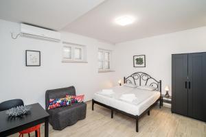 Posteľ alebo postele v izbe v ubytovaní Residence & Pool Villa Schwarz Suites