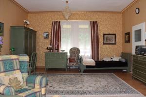 Posezení v ubytování Villa Bomberg