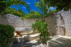 Jardín al aire libre en Zanzibar White Sand Luxury Villas & Spa - Relais & Chateaux