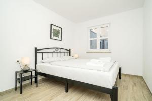 Posteľ alebo postele v izbe v ubytovaní Residence & Pool Villa Schwarz Suites