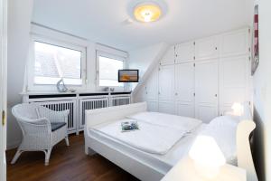 Una cama o camas en una habitación de Meeresstern