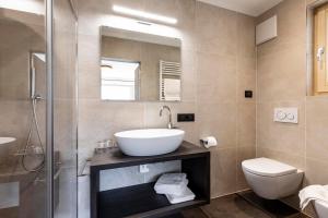 Kúpeľňa v ubytovaní Apartment Ravison
