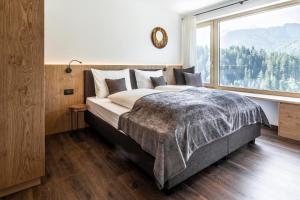 Posteľ alebo postele v izbe v ubytovaní Apartment Ravison